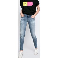 Diesel - Jeansy. Niebieskie jeansy damskie slim marki Diesel, z obniżonym stanem. W wyprzedaży za 479,90 zł.
