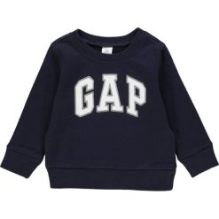 Bluza w kolorze granatowym. Niebieskie bluzy niemowlęce Gap Kids, z aplikacjami, bez rękawów, bez kaptura. W wyprzedaży za 29,95 zł.