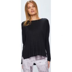 Reebok - Bluzka. Czarne koszule damskie Reebok, s, bez wzorów, z dzianiny, z okrągłym kołnierzem, bez rękawów. W wyprzedaży za 129,90 zł.