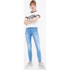 Jeansy damskie: Jeansy second skin ze średnim stanem