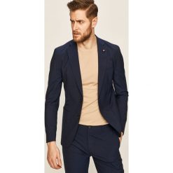 Tommy Hilfiger Tailored - Marynarka. Niebieskie garnitury męskie Tommy Hilfiger Tailored, bez wzorów, z poliesteru, eleganckie. W wyprzedaży za 1099,00 zł.