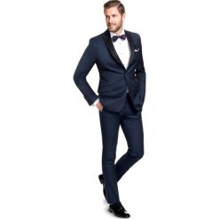 Szykowny garnitrur VALERIO 16-14X1B. Niebieskie garnitury męskie Giacomo Conti, bez wzorów, z wełny. Za 499,00 zł.