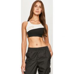 Nike - Biustonosz. Białe biustonosze sportowe damskie Nike, s, bez wzorów, z elastanu. Za 149,90 zł.