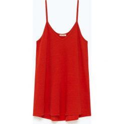 Lniany top "Lolosister" w kolorze czerwonym. Czerwone bluzki damskie nietoperze American Vintage, s, bez wzorów, ze lnu, z okrągłym kołnierzem. W wyprzedaży za 85,95 zł.
