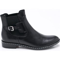 Carinii - Botki. Czarne buty zimowe damskie Carinii, z gumy, na obcasie. W wyprzedaży za 199,90 zł.