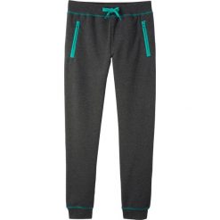 Spodnie dresowe bonprix antracytowy melanż. Szare spodnie dziewczęce marki bonprix, w paski, z dresówki, sportowe. Za 54,99 zł.