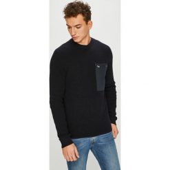 Jack & Jones - Sweter 12140246. Niebieskie swetry klasyczne męskie marki Jack & Jones, s, z bawełny, z okrągłym kołnierzem. W wyprzedaży za 159,90 zł.