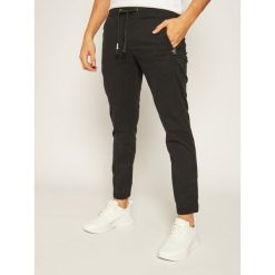 Joggery Tommy Jeans Scanton DM0DM08316. Czarne jeansy męskie Tommy Jeans, xl, bez wzorów. Za 399,00 zł.