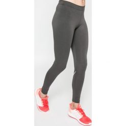 Nike Sportswear - Legginsy Leg A See Logo. Szare legginsy damskie marki Nike Sportswear, s, z nadrukiem, z elastanu. W wyprzedaży za 99,90 zł.