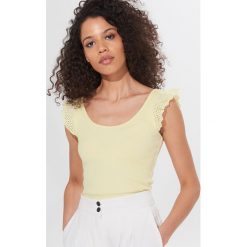 Top z bawełną organiczną Eco Aware - Żółty. Żółte topy damskie Mohito, xl, bez wzorów, z bawełny, bez kołnierzyka. Za 39,99 zł.