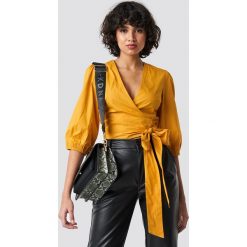 NA-KD Trend Puff Sleeve Wrap Crop Top - Yellow. Żółte topy damskie marki NA-KD Trend, bez wzorów, bez kołnierzyka. Za 121,95 zł.