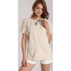 Jasnobeżowa Bluzka Guinerenna. Brązowe bluzki damskie Renee, xl, bez wzorów, bez kołnierzyka, bez rękawów. Za 59,99 zł.