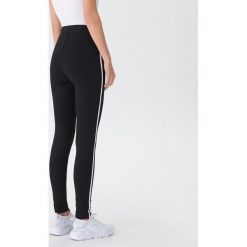 Legginsy z lampasami - Czarny. Czarne legginsy damskie marki House, s, bez wzorów. Za 59,99 zł.