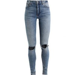 Cheap Monday HIGH SKIN Jeans Skinny Fit shift blue. Niebieskie jeansy damskie relaxed fit marki Cheap Monday, z bawełny. Za 249,00 zł.