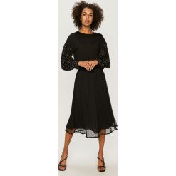 Dkny - Bluzka. Czarne bluzki damskie DKNY, na co dzień, s, bez wzorów, z bawełny, casualowe, z okrągłym kołnierzem, z długim rękawem. Za 649,90 zł.
