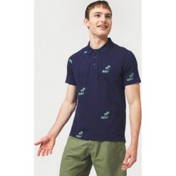 O'Neill Palm All Over Polo Koszulka Niebieski. Niebieskie podkoszulki męskie O'Neill, m, bez wzorów, z bawełny, bez rękawów. Za 180,95 zł.