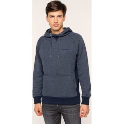 Bluza Calvin Klein Jeans Core Gdm J30J313226. Niebieskie bluzy męskie Calvin Klein Jeans, m, bez wzorów, z bawełny, bez kołnierzyka, bez rękawów, bez kaptura. W wyprzedaży za 249,00 zł.