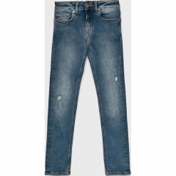 Tommy Hilfiger - Jeansy dziecięce Nora 128-176 cm. Niebieskie jeansy dziewczęce TOMMY HILFIGER, bez wzorów, z elastanu. W wyprzedaży za 239,90 zł.
