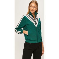 Guess Jeans - Bluza. Czarne bluzy damskie Guess Jeans, s, z aplikacjami, z elastanu, bez rękawów, bez kaptura. W wyprzedaży za 279,90 zł.