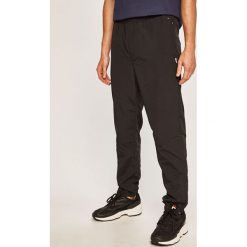 Tommy Jeans - Spodnie. Czarne spodnie męskie Tommy Jeans, na co dzień, s, bez wzorów, z jeansu. W wyprzedaży za 179,90 zł.