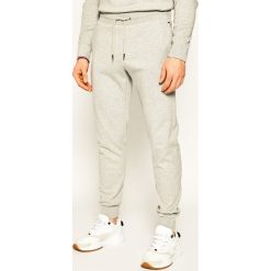 Spodnie dresowe Tommy Hilfiger Tailored 2MB TT0TT07083. Szare jeansy męskie Tommy Hilfiger Tailored, m, bez wzorów, z bawełny. W wyprzedaży za 479,00 zł.