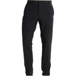 J.LINDEBERG ELLOTT MICRO Spodnie materiałowe black. Czarne spodnie męskie marki J.LINDEBERG, m, bez wzorów, z elastanu, sportowe, długie. W wyprzedaży za 407,20 zł.