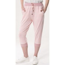 Jasnoróżowe Spodnie Dresowe Commiserate. Spodnie damskie Born2be, s, z dzianiny. Za 29,99 zł.