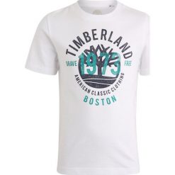 Timberland KURZARM 1973 Tshirt z nadrukiem weiss. Białe t-shirty męskie z nadrukiem Timberland, z bawełny. Za 129,00 zł.