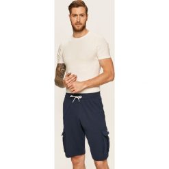 Emporio Armani - Szorty. Niebieskie spodenki i szorty męskie Emporio Armani, s, bez wzorów, z dzianiny, casualowe. Za 399,90 zł.