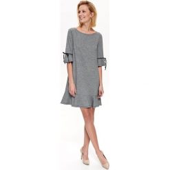 Sukienka damska. Czarne sukienki damskie Top Secret, bez wzorów, z tkaniny, eleganckie, z falbankami, bez rękawów. Za 89,99 zł.