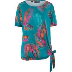 Shirt "oversize" bonprix kobaltowy turkusowy z nadrukiem. Niebieskie koszulki damskie bonprix, z nadrukiem, bez kołnierzyka, bez rękawów. Za 59,99 zł.