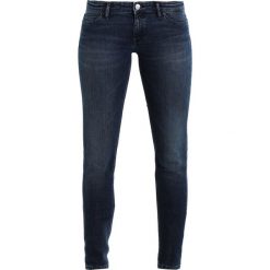 Marc O'Polo DENIM SIV Jeans Skinny Fit darkblue. Niebieskie rurki damskie marki Marc O'Polo DENIM, z elastanu. W wyprzedaży za 386,10 zł.