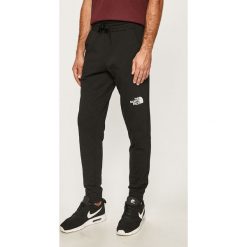 The North Face - Spodnie. Czarne spodnie męskie The North Face, na co dzień, s, bez wzorów, z bawełny, sportowe. Za 349,90 zł.