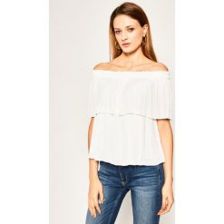 Bluzka Guess Holly W0GH57 WAFB0. Żółte bluzki damskie Guess, s, z aplikacjami, bez kołnierzyka, bez rękawów. W wyprzedaży za 229,00 zł.