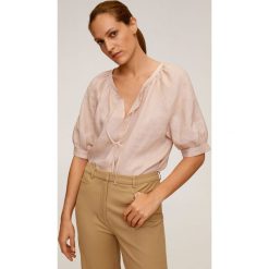 Mango - Bluzka Sanita. Białe bluzki damskie Mango, na co dzień, s, bez wzorów, ze lnu, eleganckie, z okrągłym kołnierzem, bez rękawów. Za 119,90 zł.