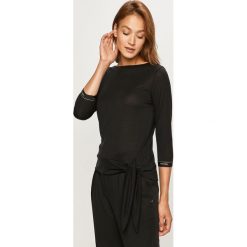 Calvin Klein - Bluzka. Czarne koszule damskie Calvin Klein, na co dzień, s, bez wzorów, z lyocellu, casualowe, z okrągłym kołnierzem, bez rękawów. Za 359,90 zł.
