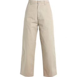 Carhartt WIP PACKARD ANKLE PANT TRABUCO Spodnie materiałowe mojave rinsed. Szare spodnie damskie marki Carhartt WIP, z elastanu. Za 419,00 zł.