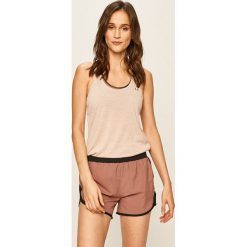 Under Armour - Top. Różowe topy damskie Under Armour, s, bez wzorów, z poliesteru, bez rękawów. W wyprzedaży za 89,90 zł.