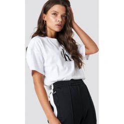 Calvin Klein T-shirt Teco True Icon - White. Białe t-shirty damskie Calvin Klein, z nadrukiem, z bawełny. Za 202,95 zł.