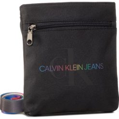 Saszetka CALVIN KLEIN JEANS - Micro Flatpack Pride K50K506255 BDS. Czarne saszetki damskie Calvin Klein Jeans, bez wzorów, z jeansu, młodzieżowe, bez dodatków. Za 229,00 zł.
