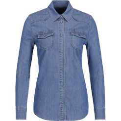 Koszula Trussardi Jeans Shirt Basic - Denim 56C00140. Niebieskie bluzki damskie Trussardi Jeans, bez wzorów, z bawełny, bez kołnierzyka, bez rękawów. W wyprzedaży za 159,00 zł.