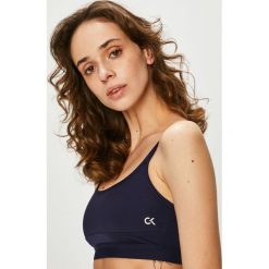 Calvin Klein Performance - Biustonosz. Niebieskie biustonosze sportowe damskie Calvin Klein Performance, xs, bez wzorów, z elastanu. W wyprzedaży za 129,90 zł.