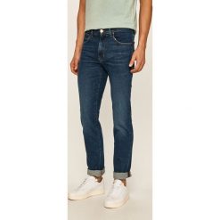 Wrangler - Jeansy Arizona. Niebieskie jeansy męskie Wrangler, z aplikacjami. Za 319,90 zł.
