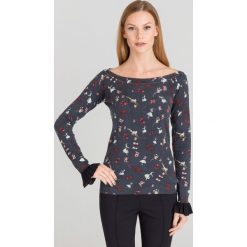 SWETER LIU JO WE WZÓR. Czarne swetry damskie Liu Jo, s, z aplikacjami, bez rękawów, bez kaptura. Za 269,50 zł.