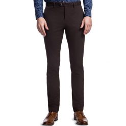 Spodnie STEFANO SMKS030103. Pomarańczowe spodnie męskie Giacomo Conti, m, bez wzorów. Za 299,00 zł.