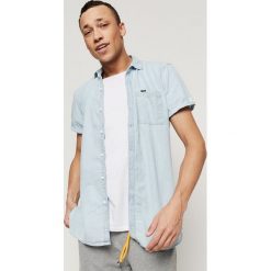 O'Neill Tech Koszula Niebieski. Niebieskie koszule męskie O'Neill, s, bez wzorów, z bawełny, bez kołnierzyka, z długim rękawem. Za 223,95 zł.