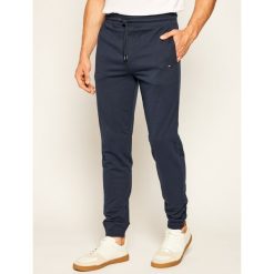 Spodnie dresowe TOMMY HILFIGER Track UM0UM01579. Szare jeansy męskie TOMMY HILFIGER, s, bez wzorów. Za 269,00 zł.