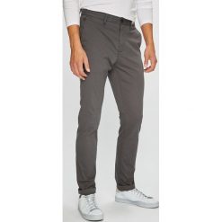 Tommy Hilfiger - Spodnie. Szare spodnie męskie TOMMY HILFIGER, na co dzień, bez wzorów, z tkaniny. Za 539,90 zł.