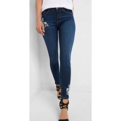 Jeansy skinny z haftem. Niebieskie jeansy damskie skinny marki Orsay, z haftami, z bawełny. Za 139,99 zł.