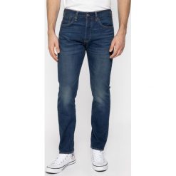 Jeansy Slim Fit Levi's 501® 28894-0196. Niebieskie jeansy męskie Levi's®, s, bez wzorów, z elastanu. W wyprzedaży za 329,00 zł.